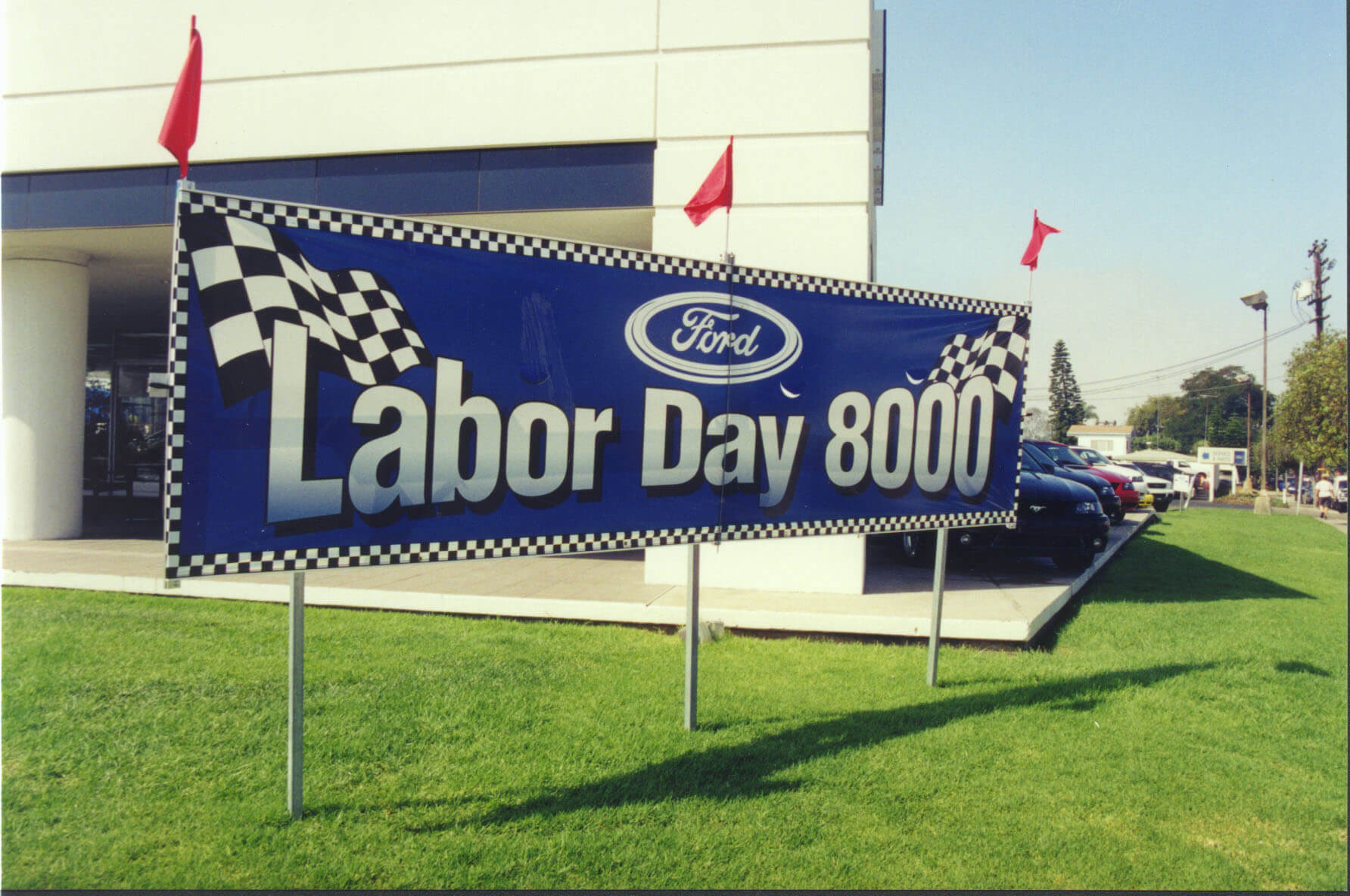 A lawn display for outdoor marketing in a car lot from Voxpop Marketing Systems